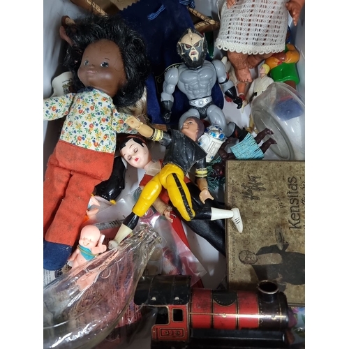 997 - An assorted vintage toys including dolls, figurines, action figures, a boxed E.T. jumbo eraser, glas... 