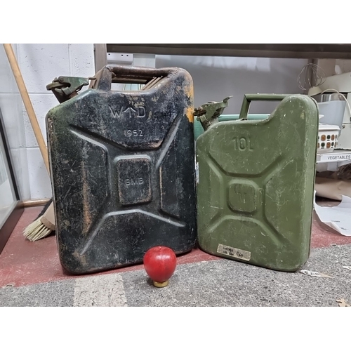 998 - A pair of vintage fuel cans, one marked 'W^D 1952 BMB,' the other a 10-liter can. Sturdy metal const... 