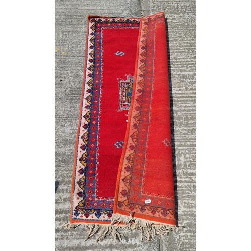 843 - A lovely retro style wool rug with beautiful burnt orange tones along with blues, reds and purples
1... 