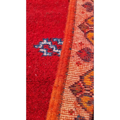 843 - A lovely retro style wool rug with beautiful burnt orange tones along with blues, reds and purples
1... 