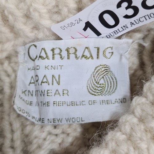 1038 - Four high quality knit cardigans including one women's cream cardigan by Carraig, 100% pure wool and... 