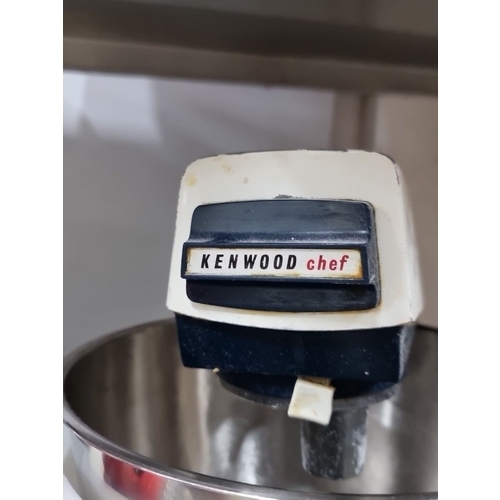 1001 - A heavy Kenwood Chef stand mixer with additional attachments, including grater and whisk. If you lik... 