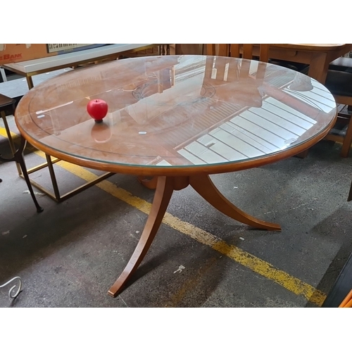 1051 - Star Lot: A fab Laura Ashley round wooden dining table with glass top and pedestal base with four le... 