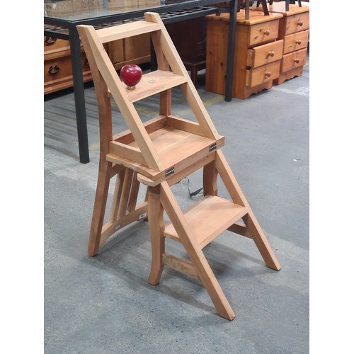 820 - Star Lot : A brand new very useful and attractive metamorphic wooden chair. Folds out to a ladder. N... 