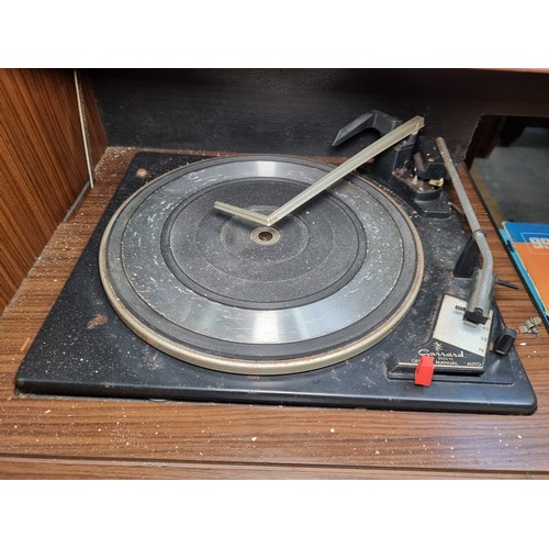 823 - A very cool 1960s vintage radiogram  music centre with concealed Garrard 2025 TC turntable along wit... 