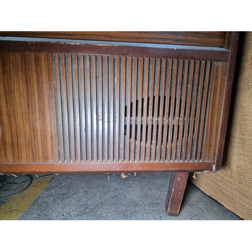 823 - A very cool 1960s vintage radiogram  music centre with concealed Garrard 2025 TC turntable along wit... 