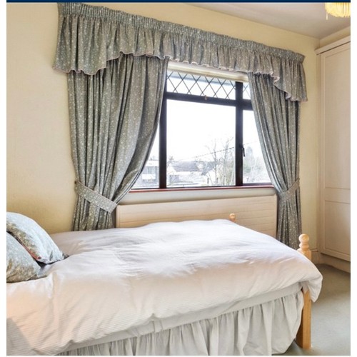 1063 - Star Lot : A Pair of light grey/ blue lined curtains with a matching pelmet and tie backs from a bed... 