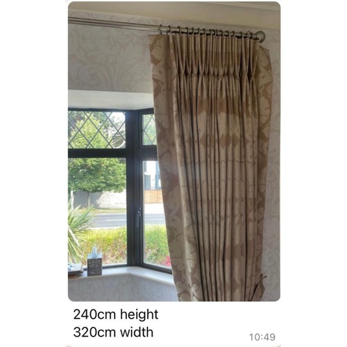 1064 - Star Lot : A Pair of light cream and beige  lined curtains with matching tie backs from a bedroom in... 