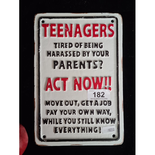 182 - A humorous heavy cast metal wall sign reading 