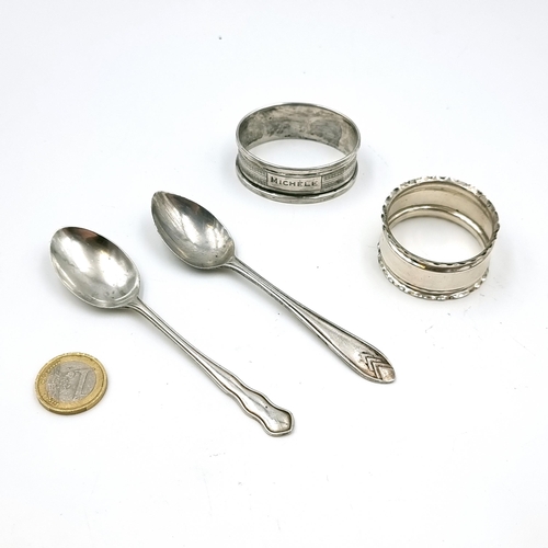 15 - A collection of sterling silver items consisting of two napkin rings one marked 'Michele' hallmarked... 