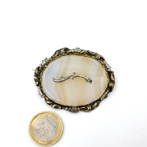 22 - A white metal Chalcedony brooch with attractive branch accent. Dimensions: 5.5 x 4 cms. Weight - 18.... 