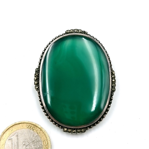 26 - A pretty Aventurine brooch set in sterling silver with marcasite detailing to mount. Weight - 10.92 ... 