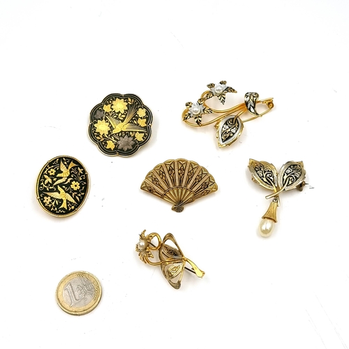 31 - A collection of Damascene Toledo jewellery consisting of six brooches. Weight - 50.69 grams. Pin int... 