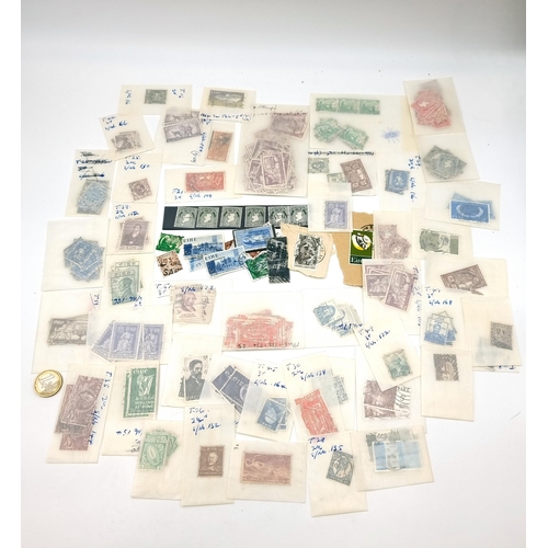 39 - A large collection of antique Irish stamps including unmounted mint examples.