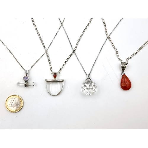 52 - Four vintage sterling silver necklaces set with gemstone detailing. Length of chains - 40 x 1, 46 x ... 