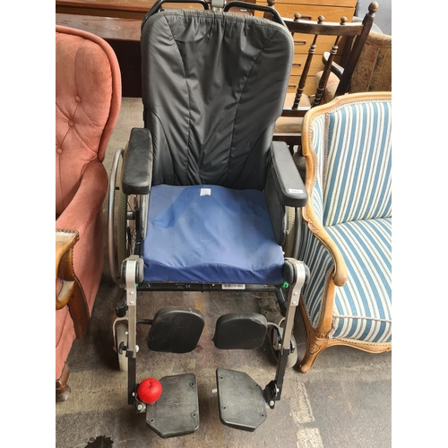 883 - A Rehab classic balance wheelchair with manual features and ergonomic design. Adjustable headrest, p... 