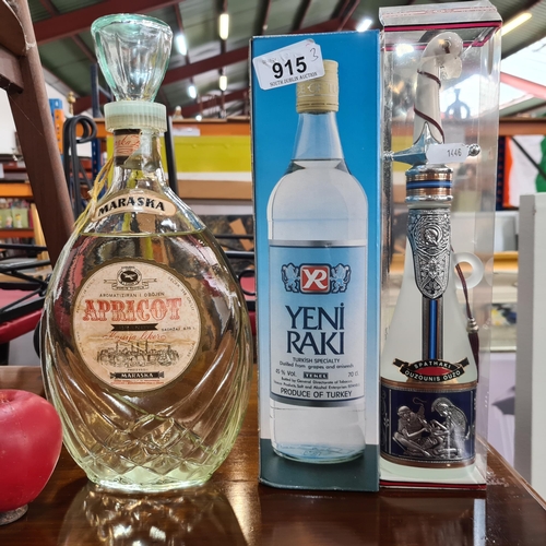 915 - A selection of three bottles of alcohol including a 70cl of Yeni Raki Turkish Specialty, an un seale... 