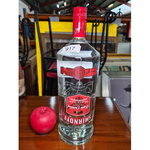 917 - A sealed 1.5l Bottle of Smirnoff Premium Vodka.