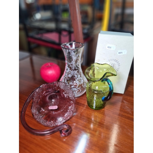 919 - Three pieces of studio art glass including a clear etched example, along with a ruby example in the ... 