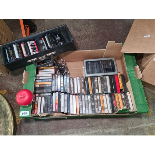 939 - A box containing a mixed assortment of vintage music cassette tapes. Nice collection.