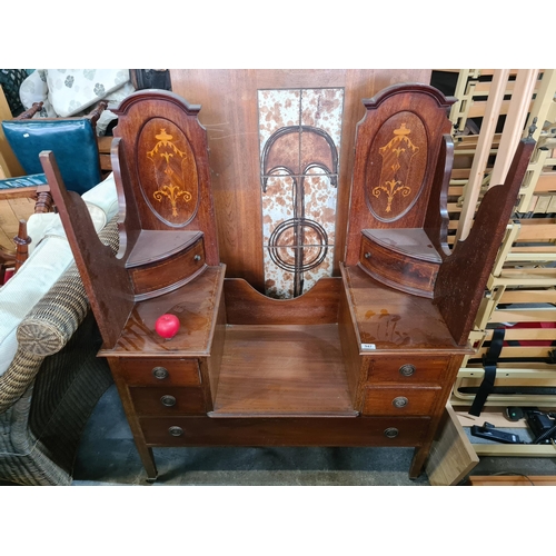 947 - A truly marvelous Edwardian triptych vanity dressing unit. Showcasing three bevelled mirrors, an arr... 