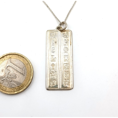 968 - A Sterling Silver necklace and pendant with impressions of Eire ingot- The symbols of the History of... 