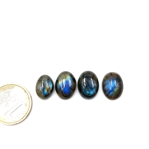 995 - Four Cabochon Labradorite stones. Total weight:36.45 carats Beautiful colour play on these.