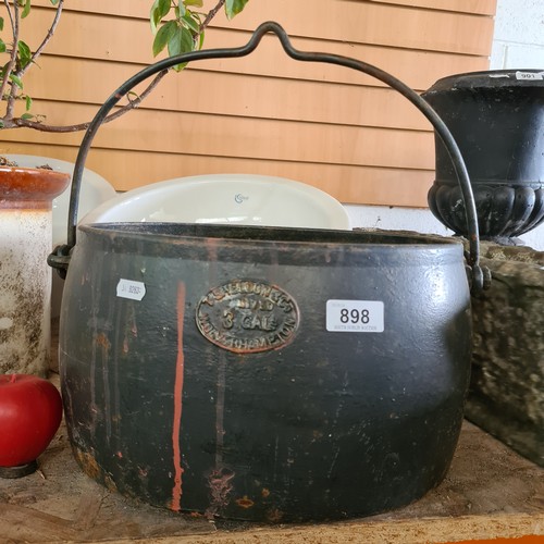 898 - A heavy Vintage Cast Iron Cauldron with handle.