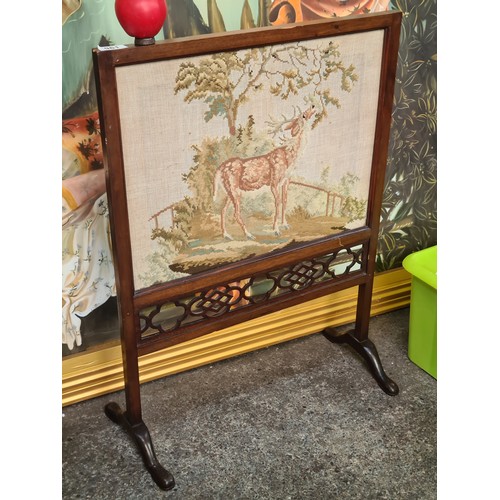 961 - A vintage mahogany tapestry fire screen portraying a deer.