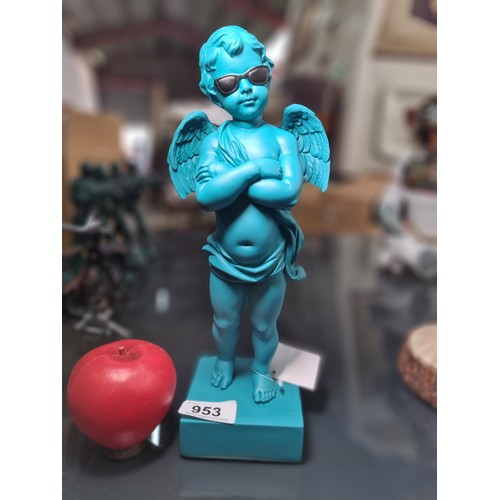 953 - An unusual turquoise blue figure of a poising cherub. Brand new from a Uk Interior Design Company