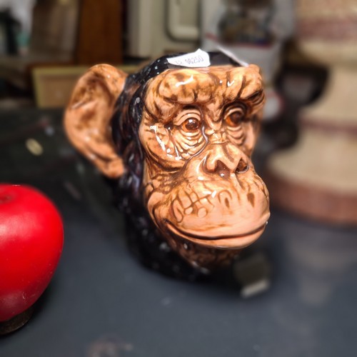 954 - A rather quirky vase in the form of a Chimps head.  Designed Jack Graham to base. Brand new from a U... 