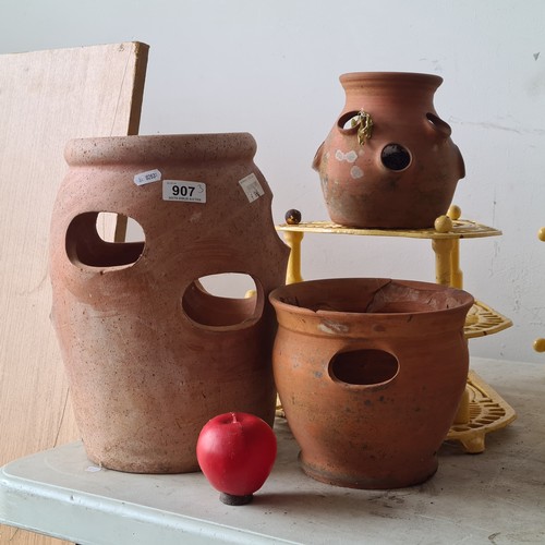 907 - Three lovely terracotta strawberry planters to house strawberries. One small Rossmore Country Potter... 