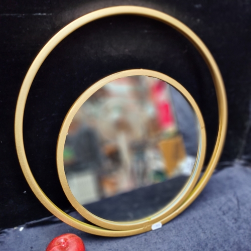 965 - A circular double infinity mirror housed in a modern gold toned frame. Brand new from Uk Home interi... 