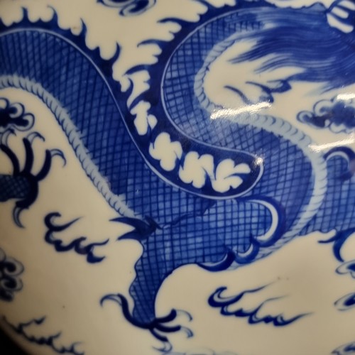 128 - Star Lot : A large antique ceramic Chinese 5 claw Dragon planter. Showcasing traditional imagery in ... 
