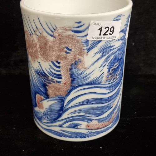 129 - Star Lot : A 19th century fabulous  ceramic Chinese brush pot in a blue and white pattern featuring ... 