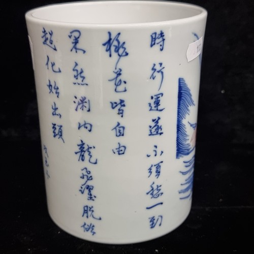 129 - Star Lot : A 19th century fabulous  ceramic Chinese brush pot in a blue and white pattern featuring ... 