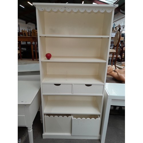 1001 - A well made shelving unit with two pull out drawers, two storage boxes and five shelves. A coordinat... 