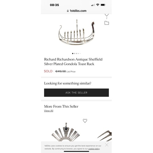123 - An elegant 1890s Gondola style silver plated toast rack. Height 15.2cm width 22.9 and depth is 7.6cm... 