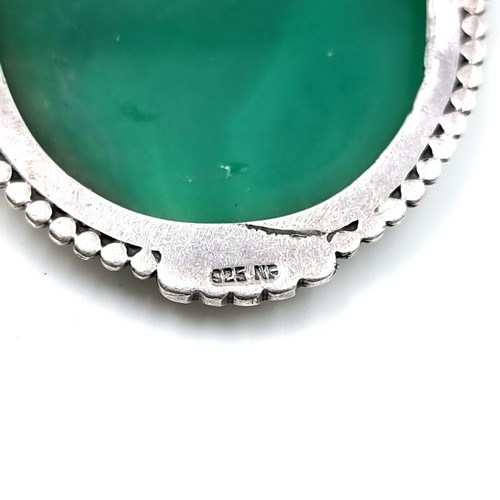 26 - A pretty Aventurine brooch set in sterling silver with marcasite detailing to mount. Weight - 10.92 ... 