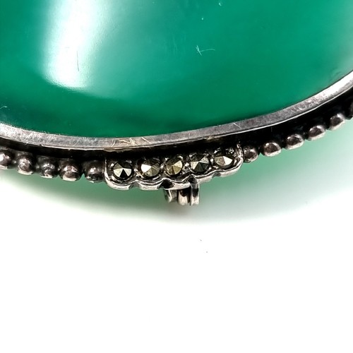 26 - A pretty Aventurine brooch set in sterling silver with marcasite detailing to mount. Weight - 10.92 ... 