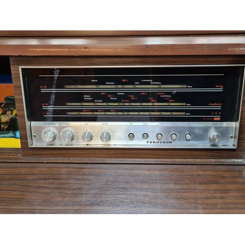 868 - A very cool 1960s vintage radiogram  music centre with concealed Garrard 2025 TC turntable along wit... 