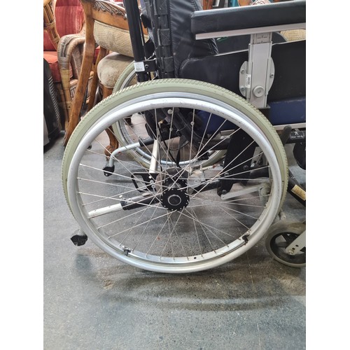 883 - A Rehab classic balance wheelchair with manual features and ergonomic design. Adjustable headrest, p... 