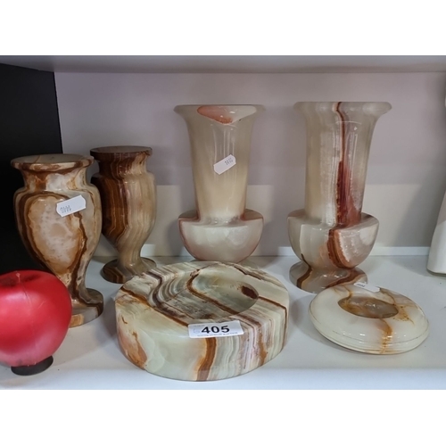 405 - Six pieces of heavy carved marble / onyx including vases and ashtrays. Wonderful colours and striati... 