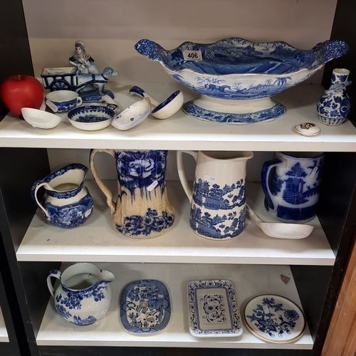 406 - A large collection of three shelves antique and vintage Blue and White ironstone Staffordshire Potte... 