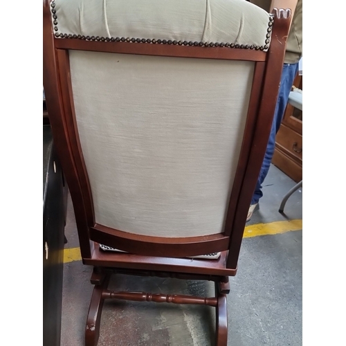 416 - Star Lot : Pair of fantastic antique high-back, wooden framed rocking armchairs with cream upholster... 