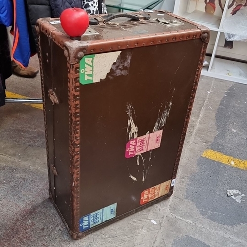 426 - Vintage travel trunk with wooden hangers and compartments. Exterior features TWA airlines Paris, Lon... 