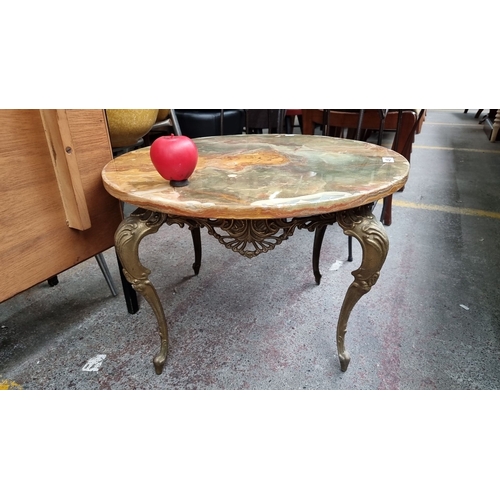 459 - Star Lot : A very elegant vintage French onyx marble topped coffee table with ornate brass metal leg... 