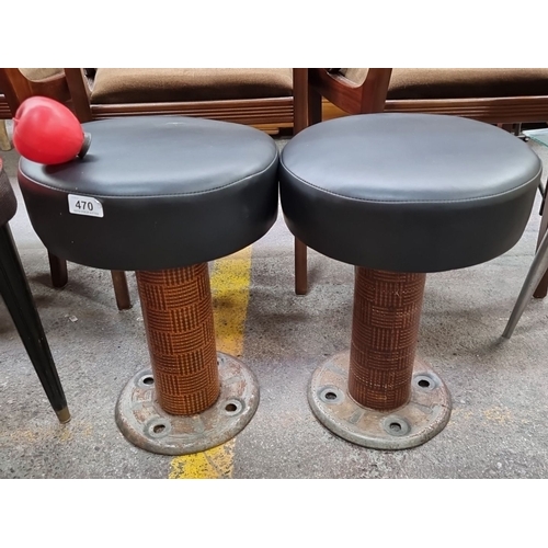 470 - A pair of vintage unusual black vinyl industrial style stools. Woven design column base.