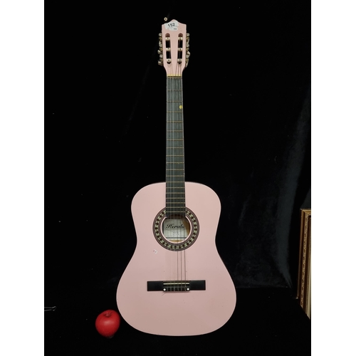 152 - A pink Herald HL 34 3/4 Size Classical Guitar Pink.