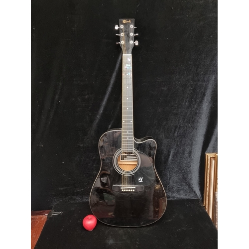 153 - A black Lindo six string acoustic classic guitar. Model: LDG-42CBK. Similar models RRP £279.99 on th... 